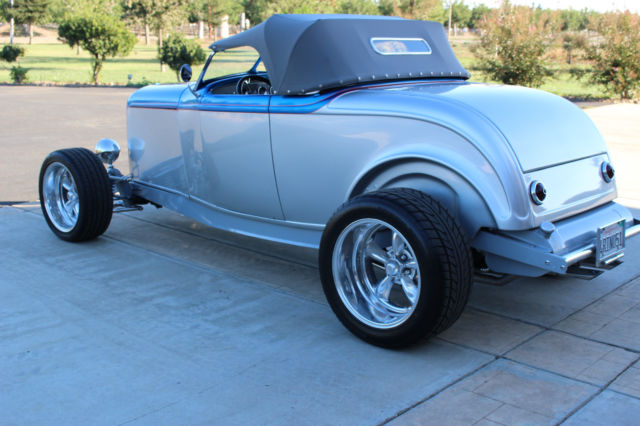 the classic 1932 ford blue hi boy roadster , better known as "the deuce,"