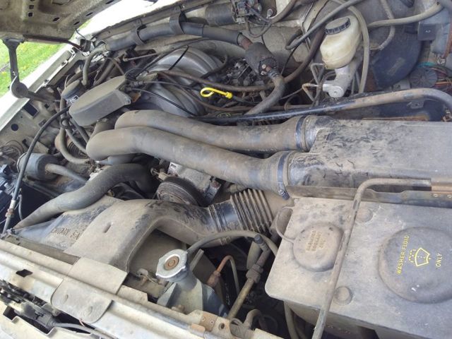 1991 ford f-150 v/8 longbed 4x4 for parts or restore