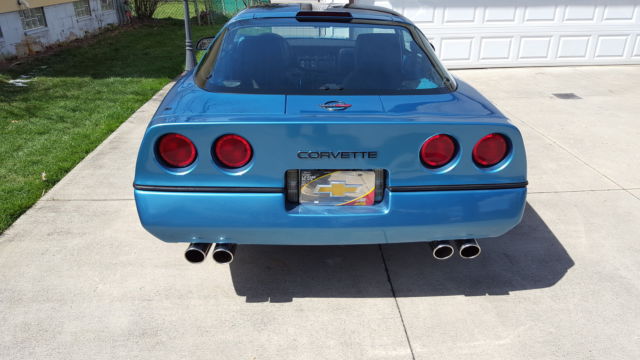 gorgeous like new medium metallic blue outside matching leather interior inside