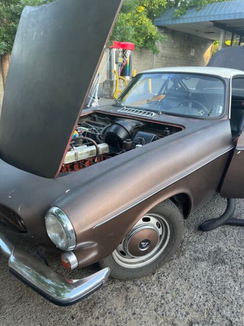 1965 volvo 1800 coupe red rwd manual chrome good condition