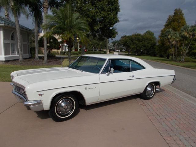 1966 chevrolet impala sport coupe showroom condition 49,396 miles factory a/c