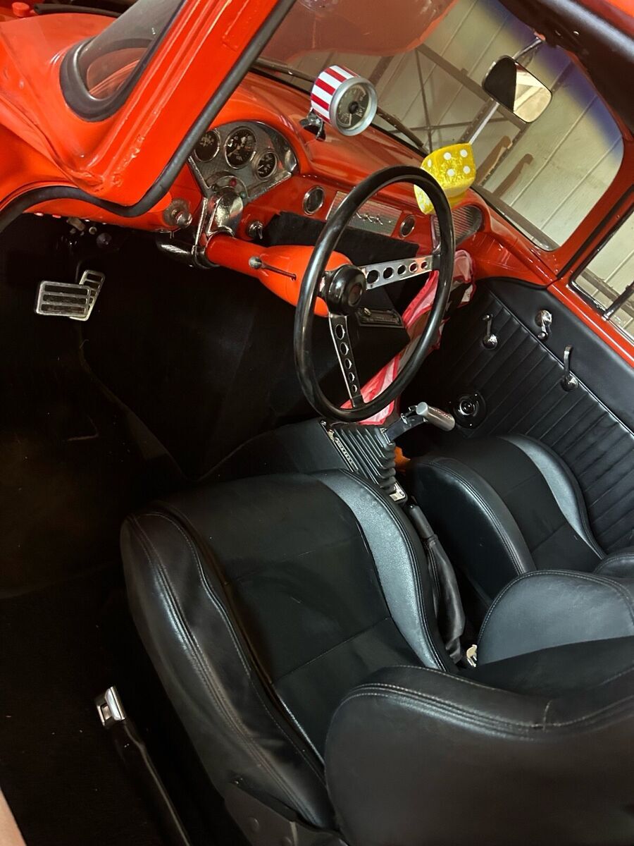 1955 chevrolet 150 coupe orange