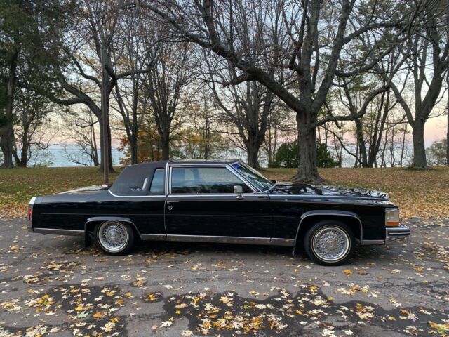 1984 cadillac fleetwood brougham 4.1 l 2 door coupe black pillow leather seats
