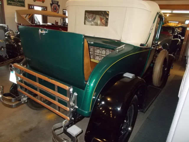 1929 ford model a sport coupe with dual side mounts
