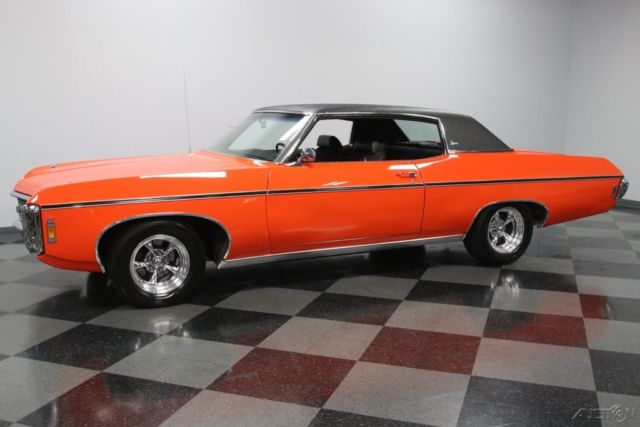 vintage classic chevy restored hugger orange black big block bbc hide away light