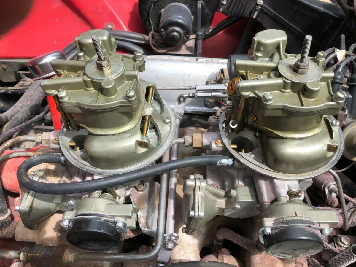dual holley 4-bbl carbs,312 c.i.d.engine w/ 3 speed od trans,new paint & softtop