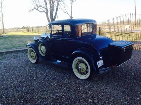 1930 model a ford navy blue, white wall tires, rumble seat, 4 cyld 66,406 miles