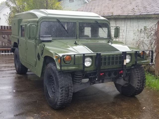 hmmwv 1990 am general m998 hummer h1 humvee helmet top military vehicle on road