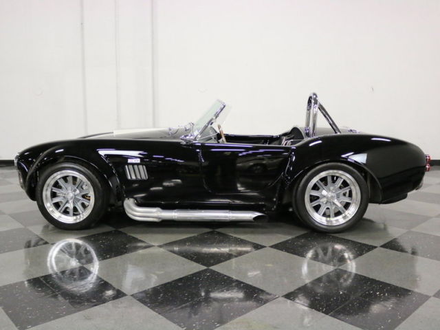 factory five w/ a fuel injected 427 v8! great black/silver color, 5 spd, a/c!!!
