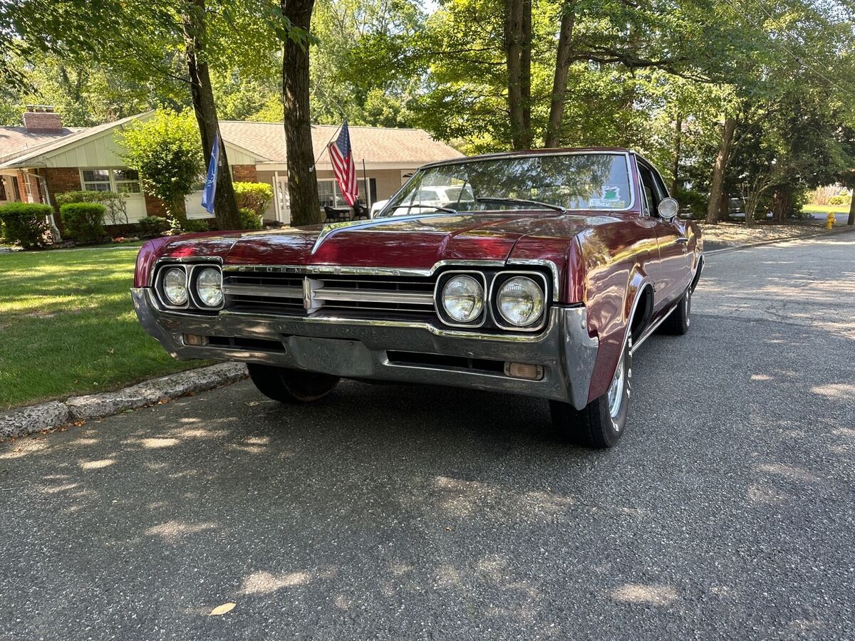 1966 oldsmobile f-85 coupe red rwd automatic holiday