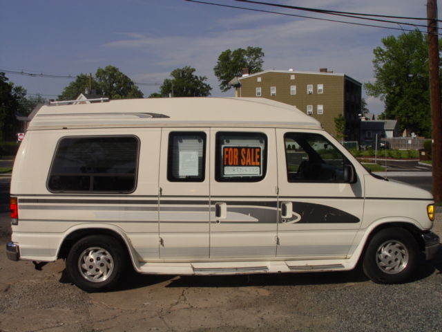 ford e150 conversion van,one owner,turn key and drive,new tires,seals & tune up