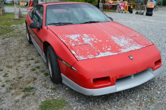 1986 pontiac: fiero runs good red 2.8lv6 5 speed