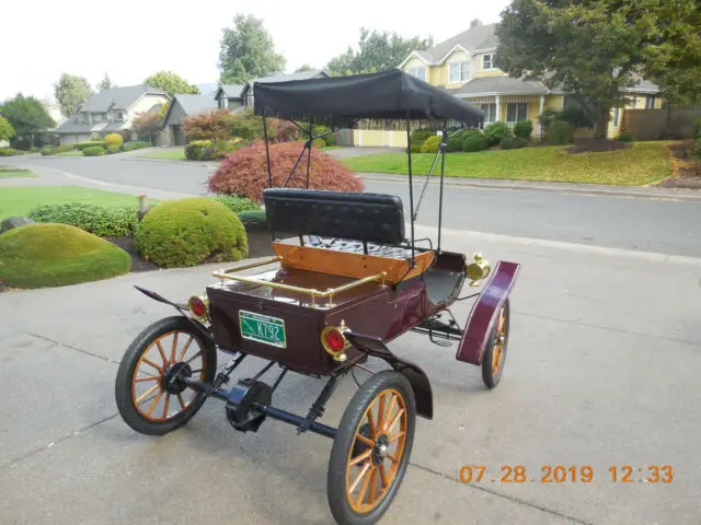 1903 curved dash oldsmobile (bliss replica)