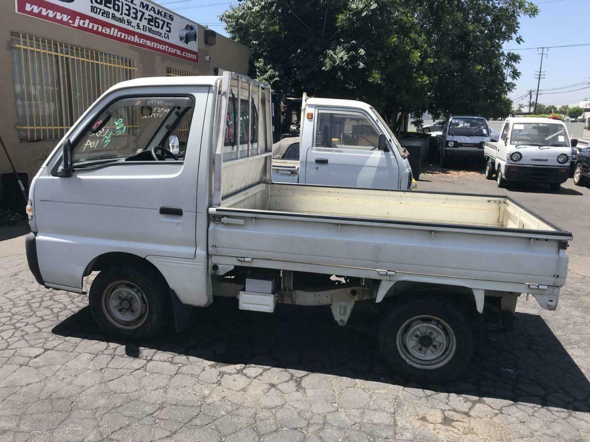 1994 suzuki carry kei truck 4mt 660cc rear wheel drive drop bed side panels