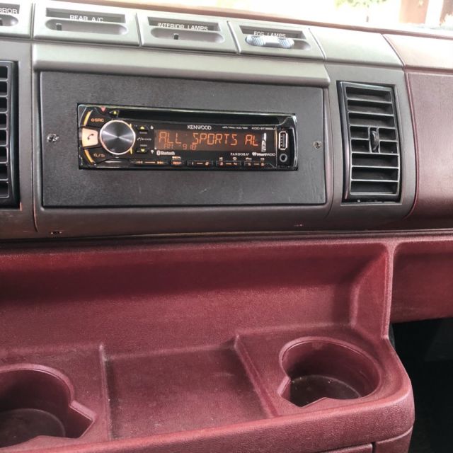 simple camping conversion; easily restorable to 3 row passenger. broken a/c