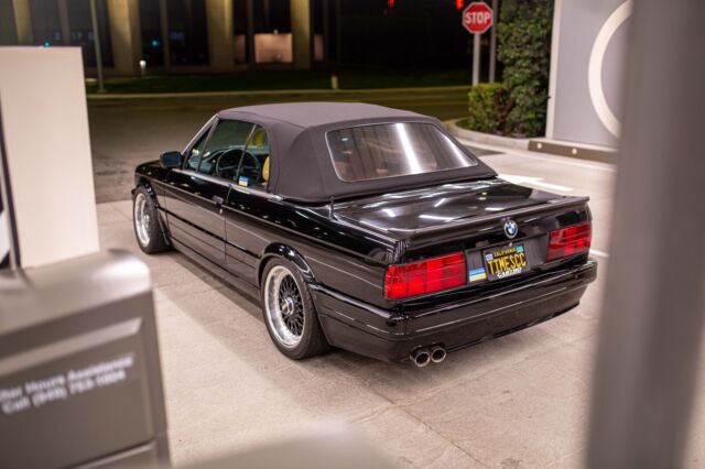 1992 325i subsequently modified e30 bmw with 3.2-liter s52 inline-six engine