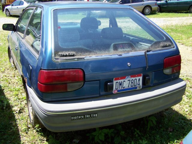 four 1988 mercury tracer hatchbacks for parts