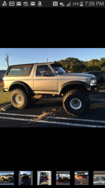 gray 1984 ford bronco 4x4 with 44" tires
