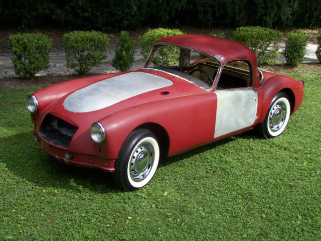 rust free 1959 mga coupe complete with $4,800 in new parts