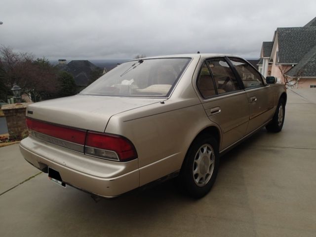1994 gold nissan maxima gxe 3.0l