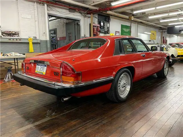 jaguar xj jaguar red with 27,500 miles, for sale!