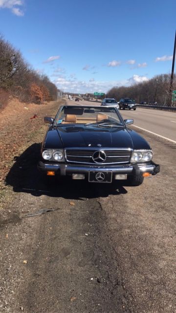 black mercedes sl380 1981 with a new soft roof! just serviced !