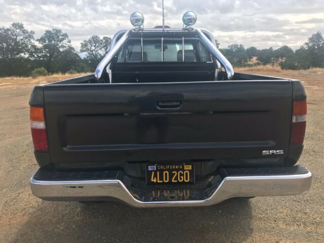 black 1994 xtra-cab toyota hilux 4x4, stick shift, v6