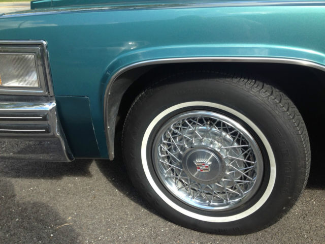 low mileage, garage kept, 2 owner cadillac