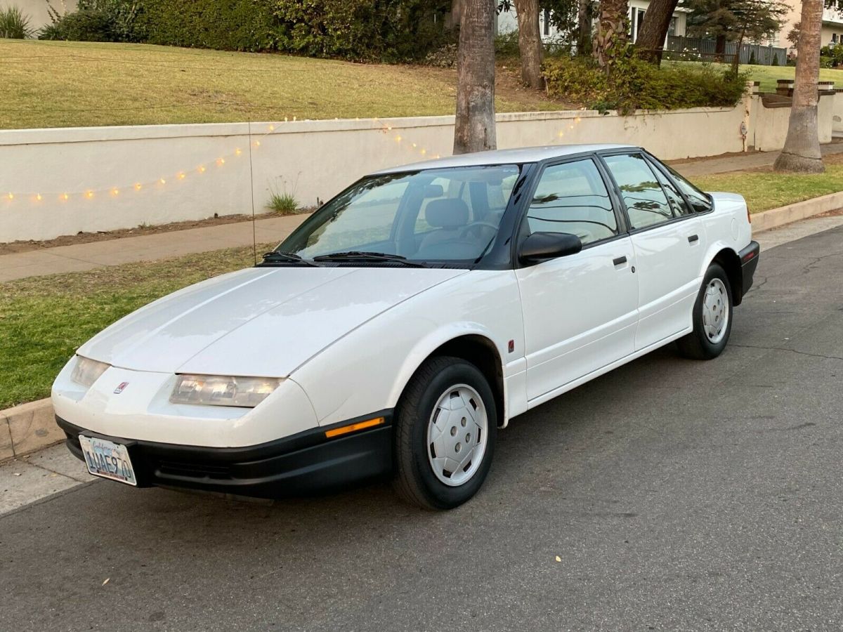 1994 saturn sl-1, one owner,78k, original, ca. car, excellent, no reserve!