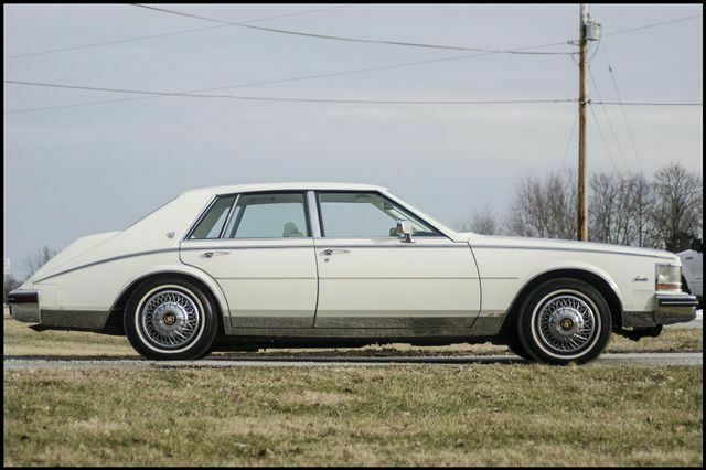1985 cadillac seville 133,252 miles white 4.1