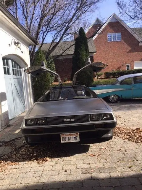 delorean dmc-12 9200 original milies w/original window sticker & sale receipt