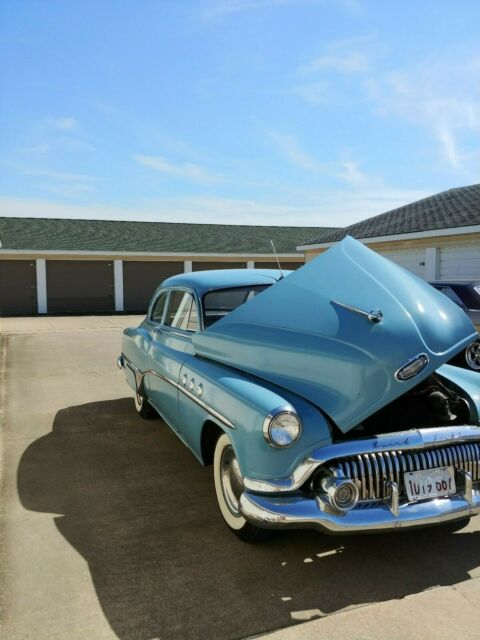 1951 buick special 2 door sedan ----------- blue with wide white wall tires
