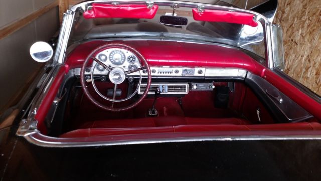 1957 ford thunderbird, black with red interior, black hard and soft tops