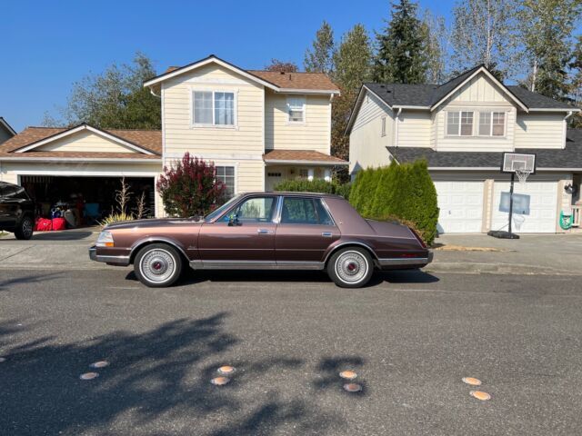 1987 lincoln continental sedan red rwd automatic givenchy