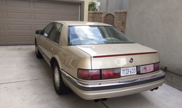 cadillac seville 1992 low miles 77k, runs great v8, perfect leather, clean paint