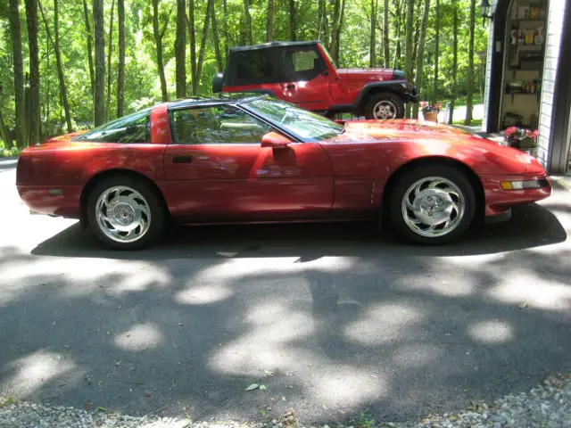 1992 corvette coupe dark red metallic w/light beige interior.. both like new!