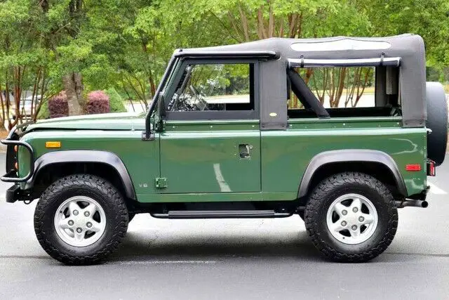 adventuremotorcars presents 1994 land rover defender 90 soft top