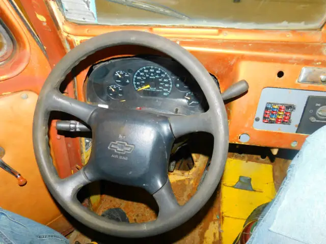 1947 willys jeep shell sitting on a chasseis of a 2001 chev s10 t1266095