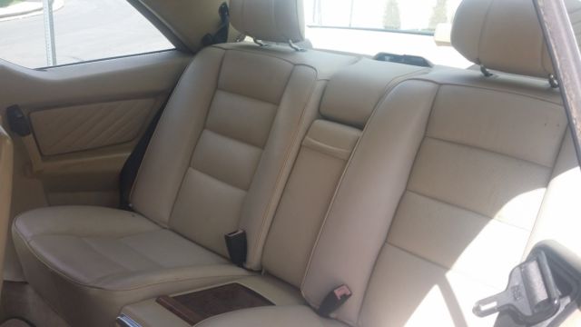 mercedes benz 560-sec. suede headliner, cross drilled rotors. chrome wheels
