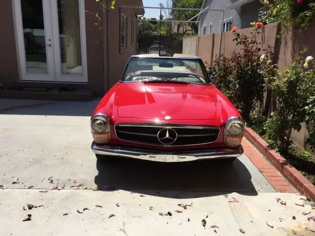 red mercedes 280 sl convertible