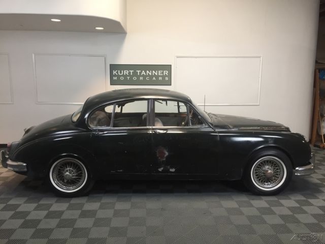 1962 jaguar mk2 3.8 liter sports saloon. brg/biscuit. 4-speed manual od. wires