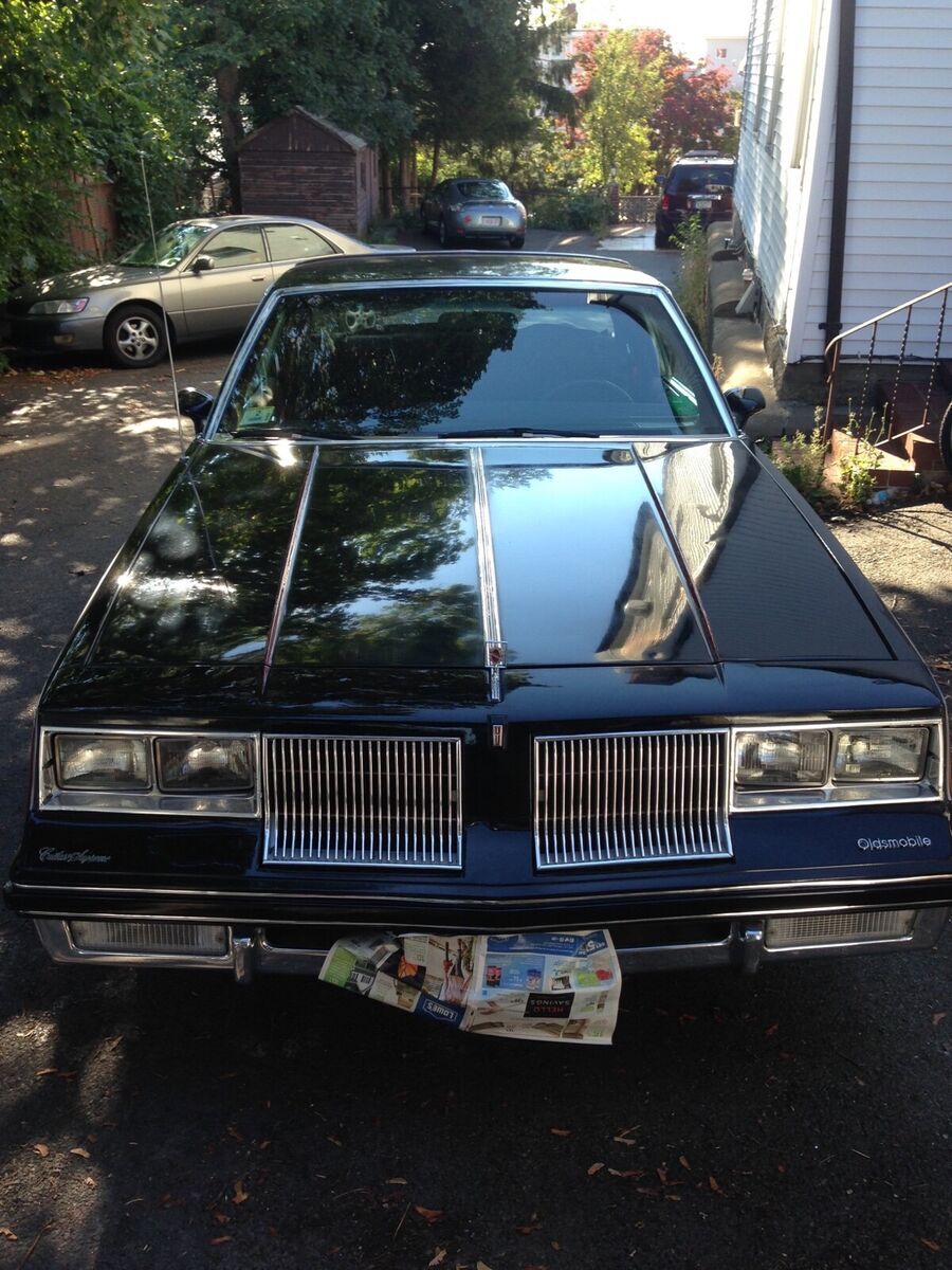 1986 oldsmobile cutlass coupe black rwd automatic brougham