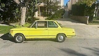 1972 bmw 2002 coupe yellow rwd manual