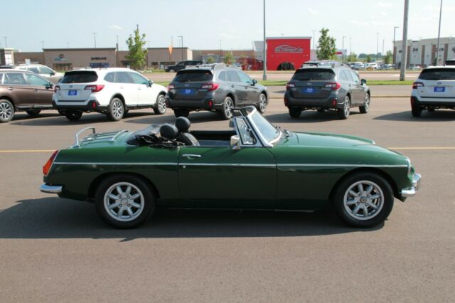 1976 mg roadster!!! green with black top, great summer fun!!!