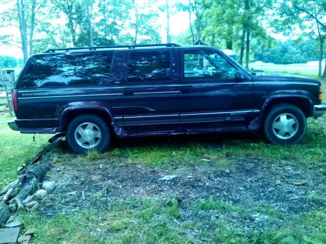 1994 gmc suburban 4x4 sle 144,000 miles, leather, low reserve four wheel drive