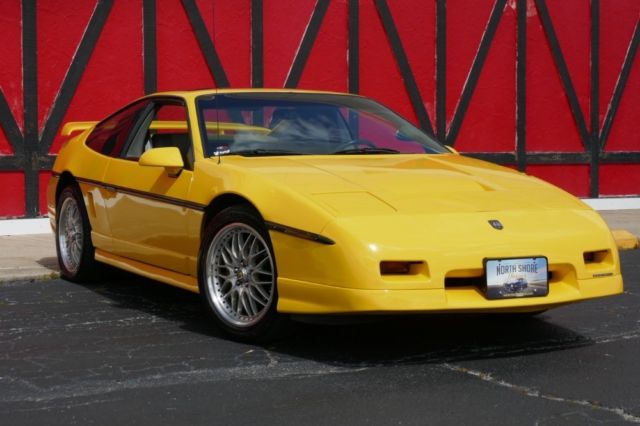 yellow pontiac fiero with 172,000 miles available now!