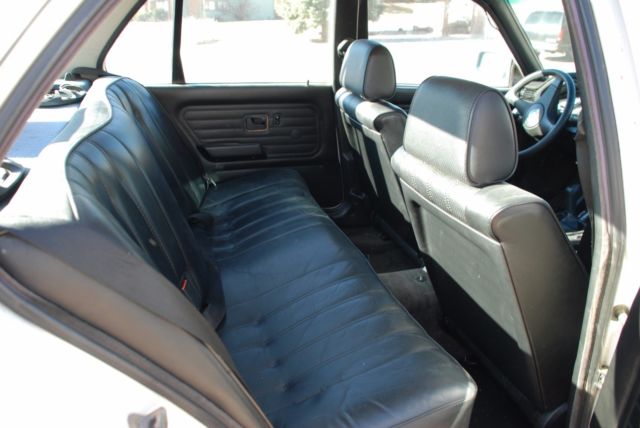 white 1987 bmw 325i sedan