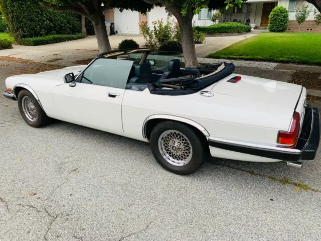 1986 jaguar xjs, white with blue leather interior. low mile, one owner, no rust
