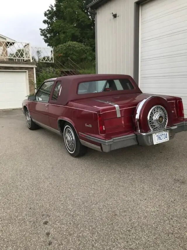 super low mileage -1987 cadillac coupe -super low mileage 70k km = 44k miles