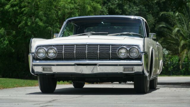 gorgeous artic white w/red leather low mileage suicide door convertible